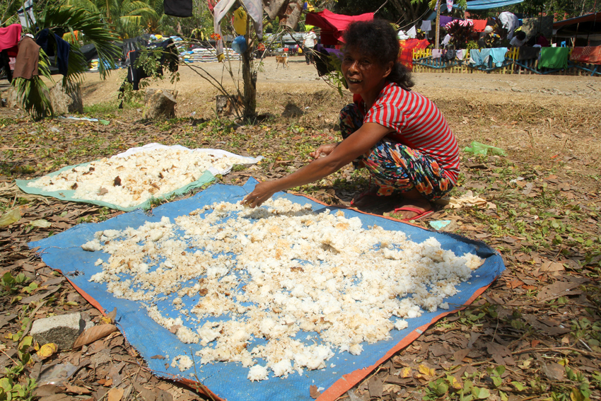 BAUG-HON. This is rice for another day for Crecencia Manlakatan, a 39-year old peasant. She dries the left-over cooked rice under the sun, explaining that  when the leftover rice hardens, it can be cooked again like ordinary rice.  This is what they practice in their community in Arakan Valley, North Cotabato. (Ace R. Morandante/davaotoday.com)