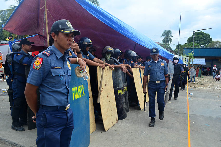 Despite the blaring sound convincing protesters to go home, protesters stand on their ground and refused to heed police call until their demands will be met.(Earl O. Condeza/davaotoday.com)