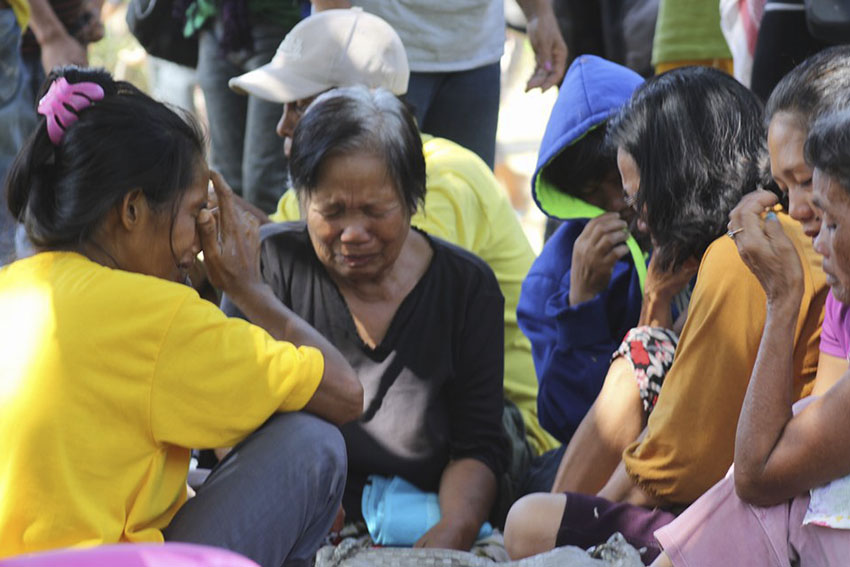 These women farmers from Arakan Valley cry out of fear after their colleagues reported that their sanctuary in Spottswood Methodist Center, Kidapawan City will be bombed and entered by the police. (Ace R. Morandante/davaotoday.com)