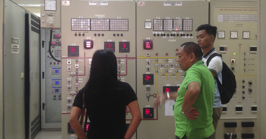 A personnel of the National Grid Corporation of the Philippines (NGCP) District 6 in General Santos City explains to members of the media the process on how to monitor and manage energy in the control room of NGCP. (Maria Patricia C. Borromeo/davaotoday.com) 