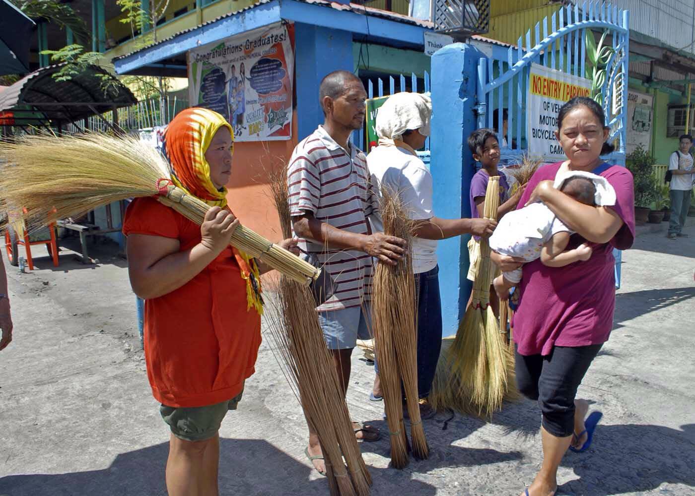 Broomsticks and other cleaning supplies are saleable these days especially outside public schools as the Department of Education commences the Brigada Eskwela 2016. This photo is taken outside Magallanes Elementary School in Davao City as parents, teachers, students and volunteers for Brigada Eskwela flock to schools to help in the annual school clean up. (Ace R. Morandante/davaotoday.com)