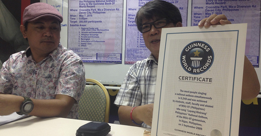 GUINNESS RECORD. Arnold A. Garbanzos, who is the special coordinator for Guinness for the camp of presidential candidate Rodrigo Duterte, shows the certificate of their Guinness World Record for the most number of people singing the national anthem in Iligan City last September 1, 2009. (Zea Io Ming C. Capistrano/davaotoday.com)