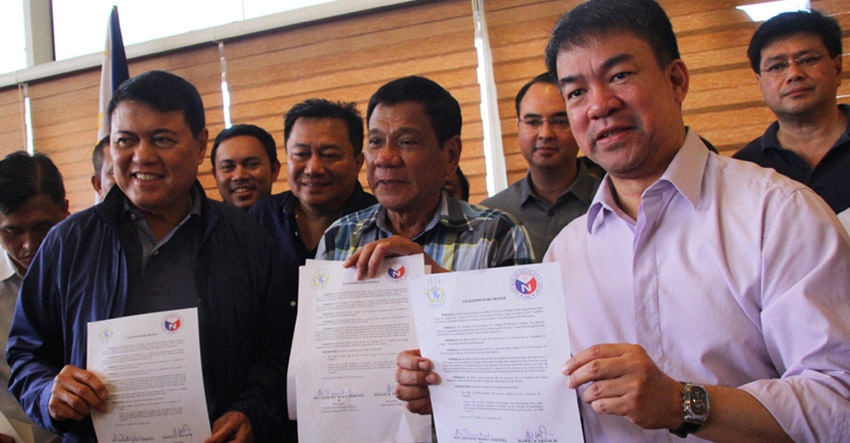 'COALITION FOR CHANGE'. The Partido Demokratiko Pilipino Lakas ng Bayan (PDP-Laban) and the Nacionalista Party sign an agreement to support the programs of the incoming administration. From left, former Senator Manuel Villar, president of the NP and Senator Aquilino Pimentel, president of the PDP Laban. The agreement was signed Monday afternoon at the Matina Enclaves in Davao City. (Ace R. Morandante/davaotoday.com)