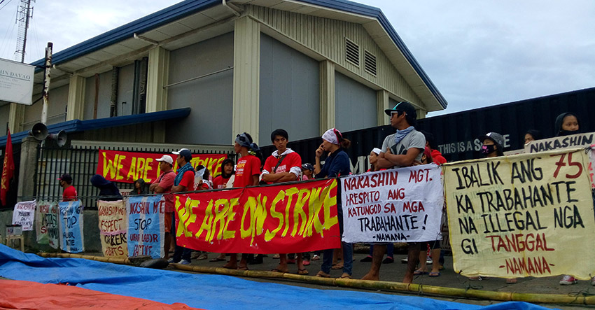 SETTING UP. At 5:00 am, Wednesday (May 25) protesting workers set up their camp at the gates of Nakashin Davao International, Inc in Malagamot Panacan paralyzing its operations. (Earl O. Condeza/davaotoday.com)