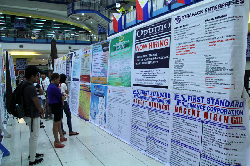 Huge tarpaulins are displayed at the NCCC Mall in Davao City showing various companies that offer slots for applicants among fresh graduates and unemployed youth.(Ace R. Morandante/davaotoday.com)