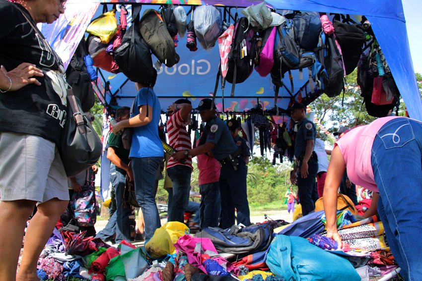 NOT FOR SALE. The police confiscates back packs and umbrellas from party-goers since bringing it inside the event area is not allowed. However, after the party, several party-goers found their belongings missing. No claim stubs were also given to those who left their belongings with the police. 