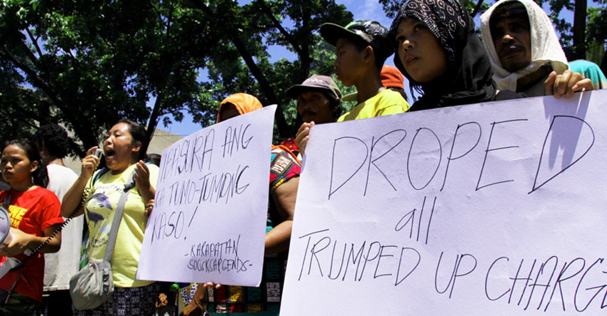 PROTEST.More or less 1000 activist trooped infront of the Hall of Justice, Wednesday to protest the issued warrant of arrest on the 15 militant leaders accused for kidnapping and illegal detention on Lumad evacues in UCCP haran.(Ace R. Morandante/davaotoday.com)