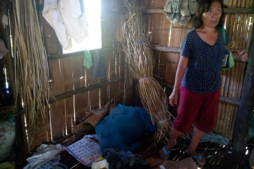 AFTERMATH. Family members of the survivors of the strafing of a house in Laak, Compostela Valley witnessed the aftermath of the shooting. They note the missing personal belongings such as identification cards, wallet, mobile phones, and clothes. (Earl O. Condeza/davaotoday.com)