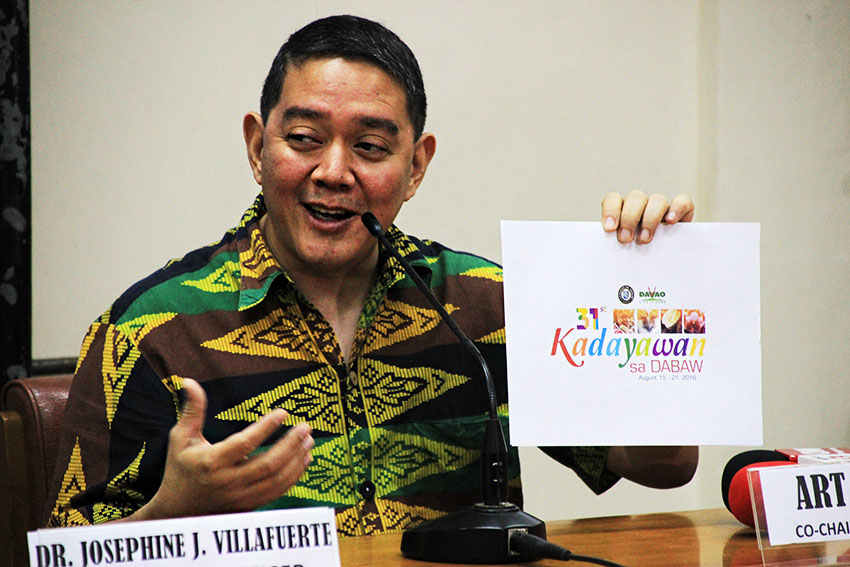 LOGO. Art Boncato, the co-chairperson of the Kadayawan 2016 Executive Committee, shows the design of this year's Kadayawan logo, a modified version of what was used for last year. Boncato said that this year's celebration will be open-themed, in order to give focus to the festival itself. (Paulo C. Rizal/davaotoday.com)