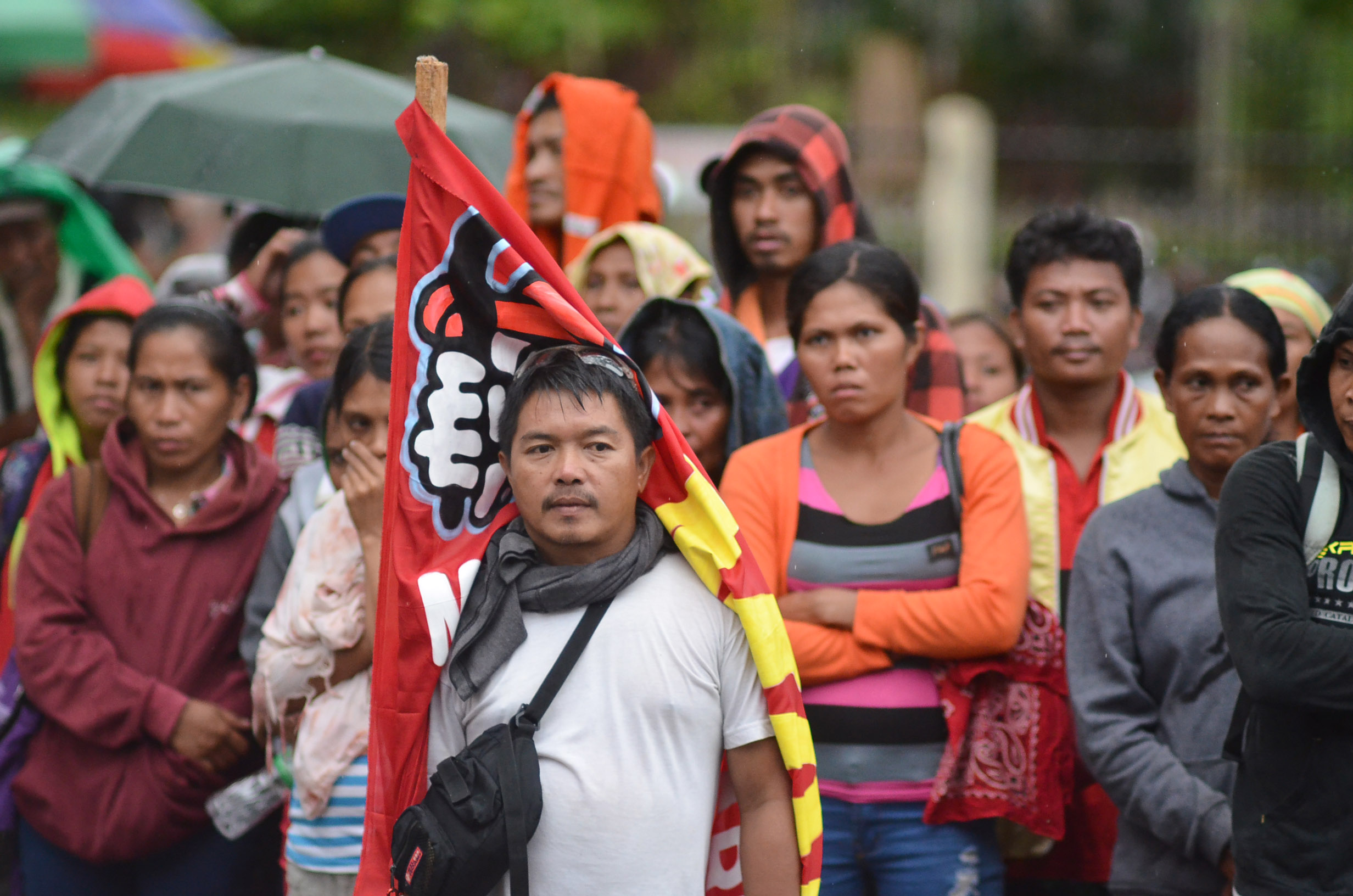 Farmers brave the rain to attend the rally held at Rizal Park, Davao City and to witness in a large screen the first State of the Nation Address of the President. (Medel V. Hernani/davaotoday.com)