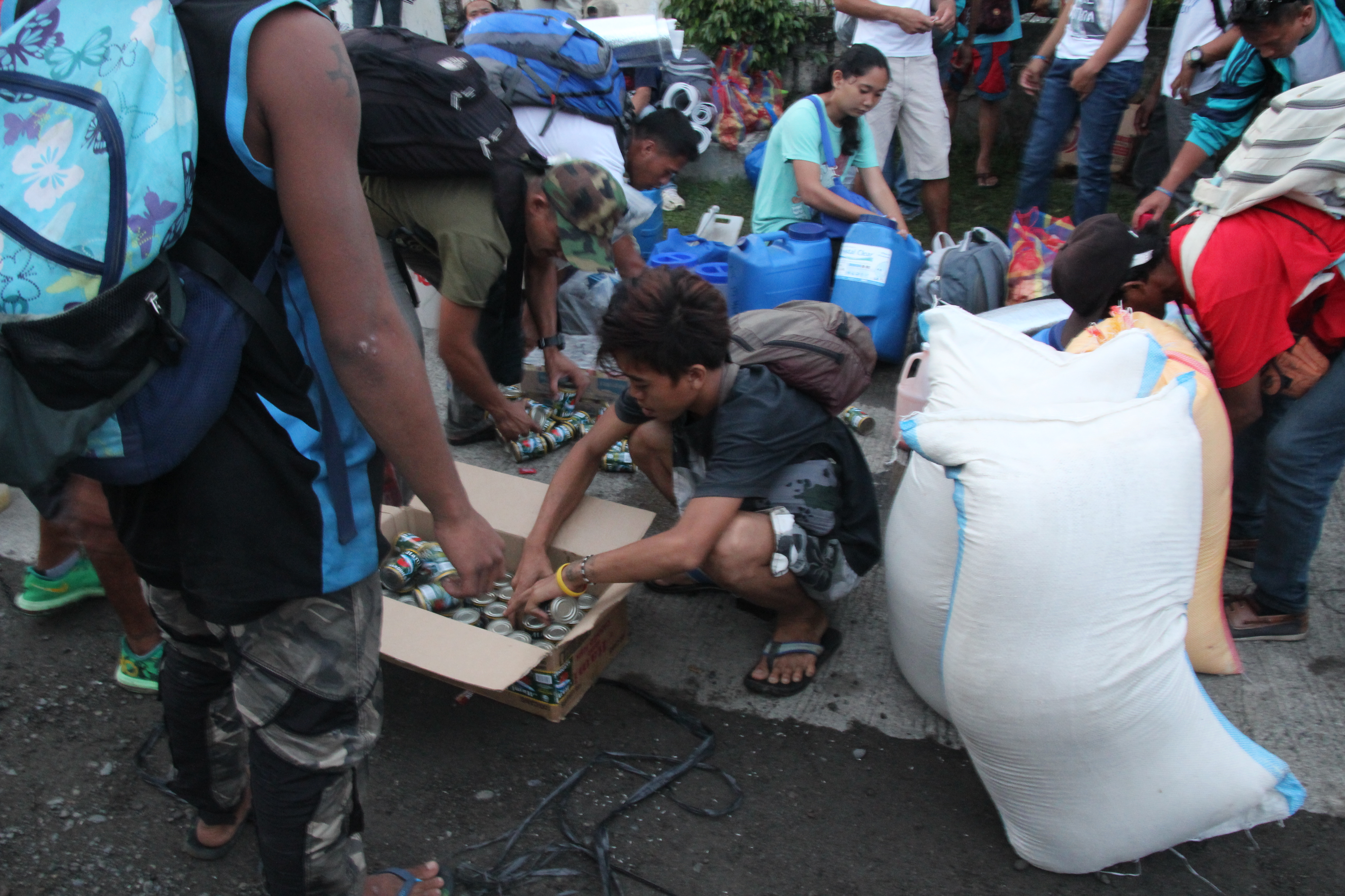 Delegates pack up canned goods and sacks of rice as they prepare for the travel to witness President Rodrigo Duterte’s first State of the Nation Address in Manila.