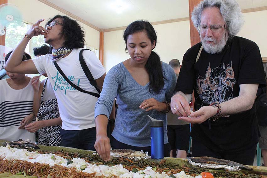 Human rights activists from US and Hongkong partake in a solidarity lunch with their Filipino counterparts and the indigenous peoples evacuees at the United Church of Christ in the Philippines Haran compound in Father Selga Street, Davao City on Saturday noon, July 16. The foreign delegates are part of the International Solidarity Mission which will conduct a humanitarian relief and medical mission in different parts of Mindanao including Talaingod in Davao del Norte and Arakan in North Cotabato. (Medel V. Hernani/davaotoday.com)