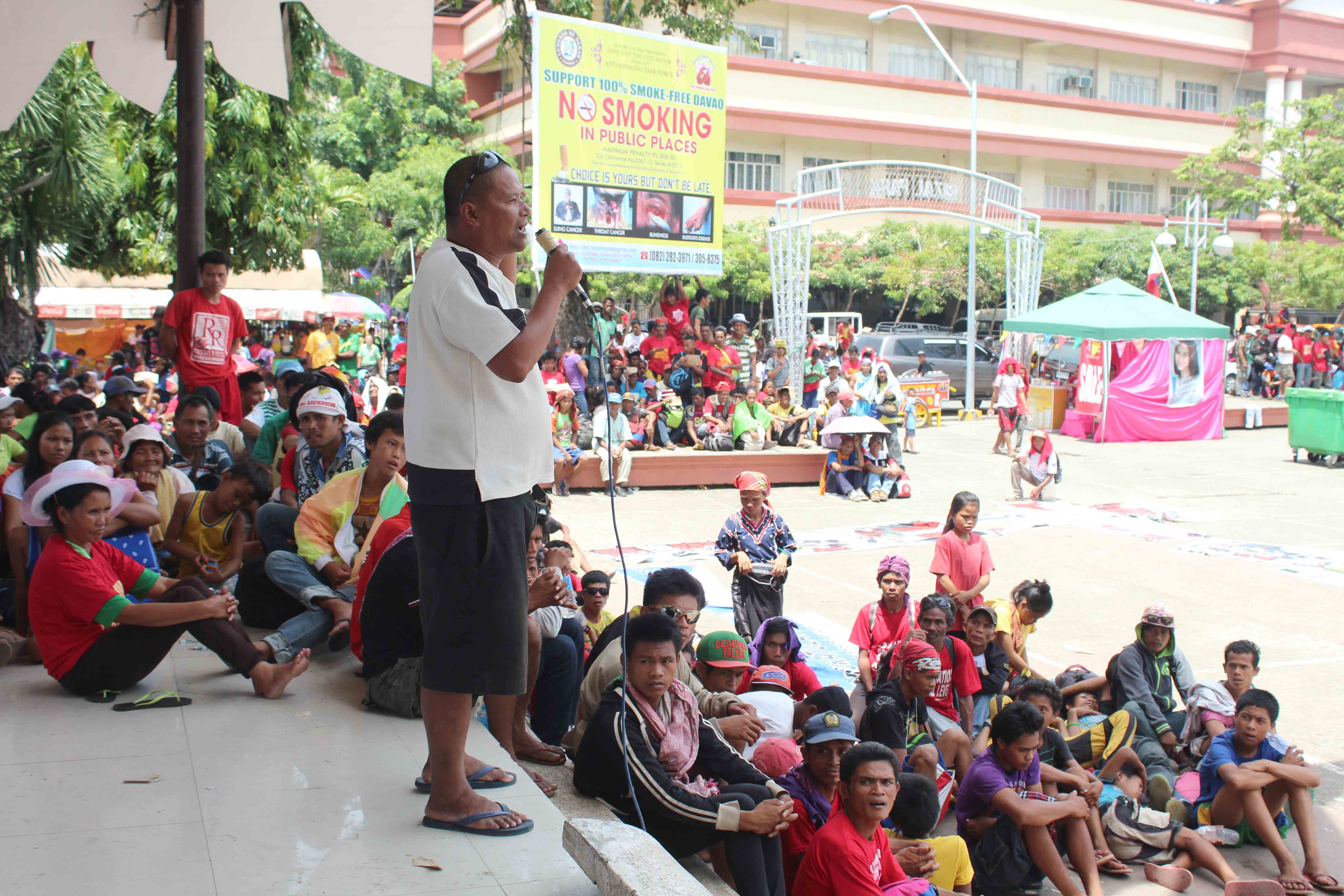 A farmer speaks before the crowd and thanks President Rodrigo Duterte for "accepting the challenge for change". 