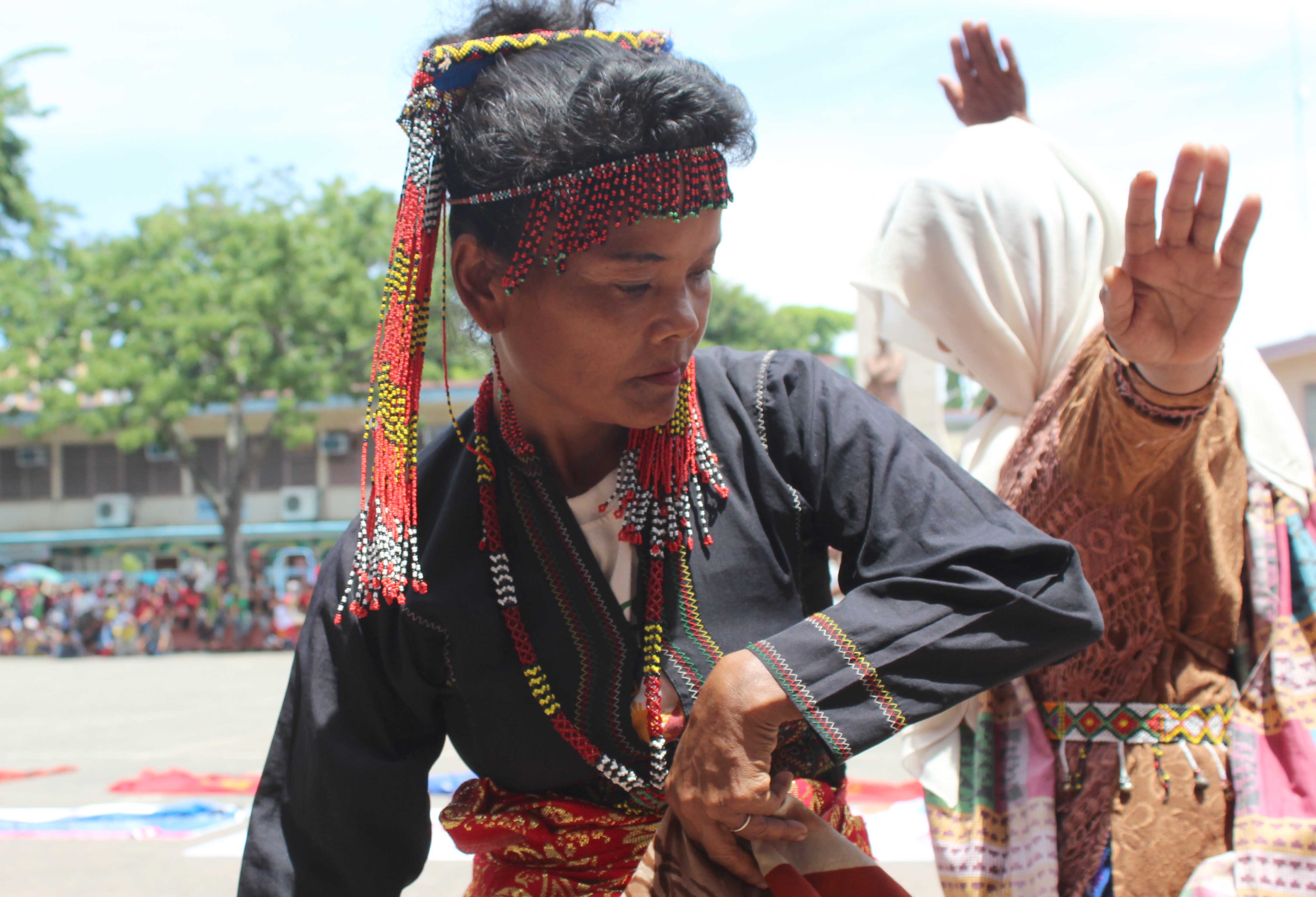 A tribal woman from Esperanza, Sultan Kudarat dances during the rally at the Rizal Park in Davao City on Thursday, June 30. Members of the Dulangan Manobo tribe from Esperanza Sultan Kudarat, and T'boli Manobo tribe from Nababanga,South Cotabato were among those who performed in the gathering of farmers and indigenous peoples to support the new administration's program for peace. 