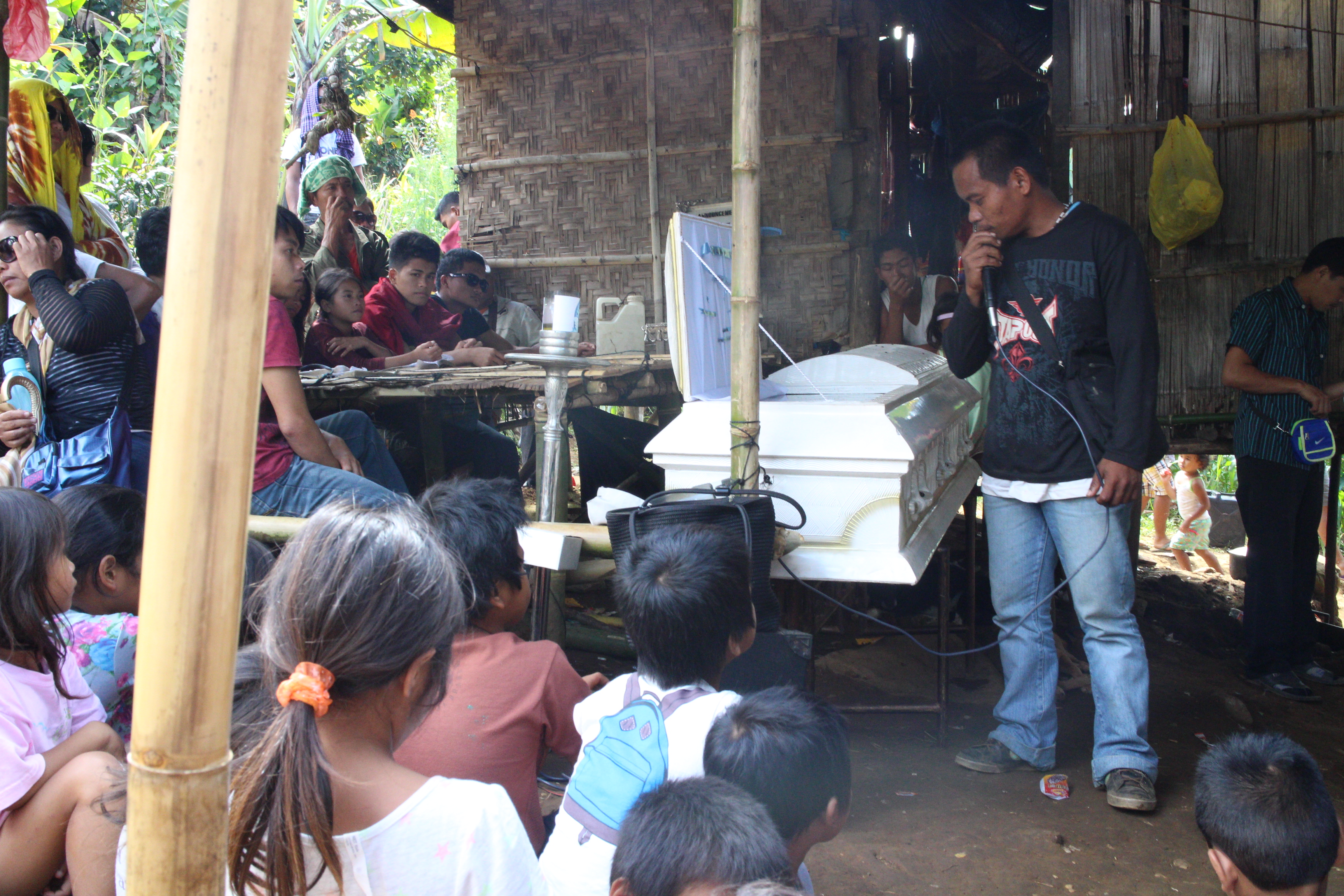 Datu Marcelo Guillego, the tribal leader of Sitio Diolo, speaks during the burial of Herme Alegre. Guillego was supposed to be attending the meeting called by the NCIP but he was sick during the time and Alegre attended on his behalf. 