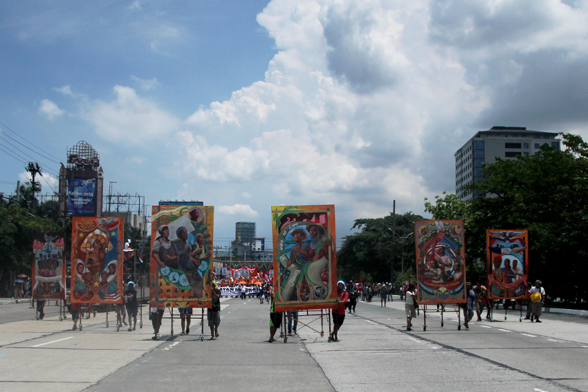 LINED UP. The giant murals were lined up upon entering the Batasan road. 