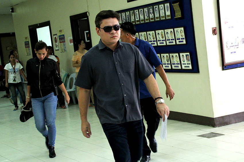 A day after attending their father's inauguration in Malacañang, Davao City Vice Mayor Paolo Duterte walks fast from his office at the City Council to attend a press conference here on Friday, July 1. He announced that City Mayor Sara Duterte is on leave until July 22. Duterte is accompanied by his security details who are members of the Presidential Security Group. (Ace R. Morandante/davaotoday.com)