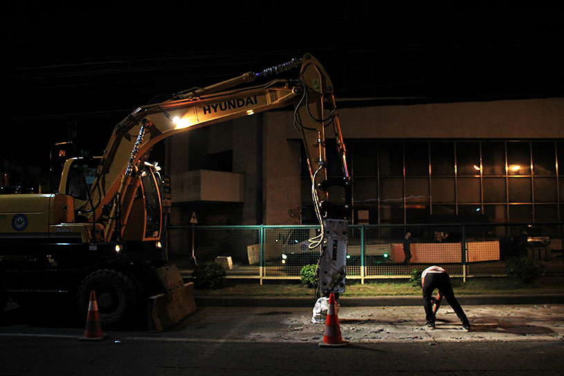 Workers repair the road near Bangkerohan Public Market  at 3:00  am to avoid causing traffic in one of Davao City's busiest roads. (Paulo C. Rizal/davaotoday.com)