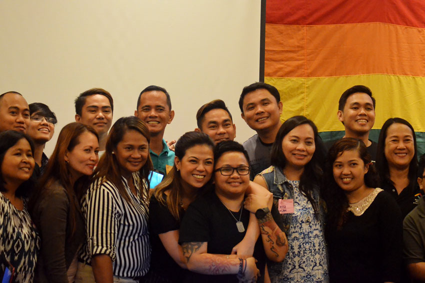 Film Development Council Chairperson Liza Diño-Seguerra and husband,  Commissioner Aiza Seguerra of the National Youth Commission pose with journalists during the Pink Ink, a training to empower media practitioners to deal with LGBT human rights issues held at the Seda Hotel in Davao City on Saturday, August 20, 2016. The couple spoke on the topic of SOGIE 101 or Sexual Orientation Gender Identity and Expression. (Zea Io Ming C. Capistrano/davaotoday.com)