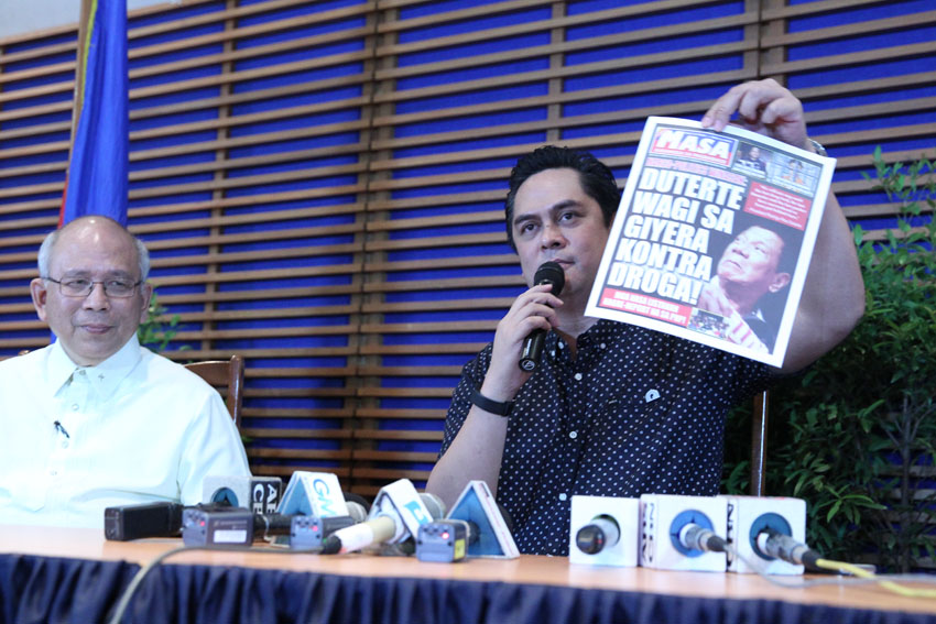 Communications Secretary Martin Andanar shows a copy of the first issue of the bi-monthly "Mula sa Masa, Para sa Masa" publication of the Presidential Communications Office. He said the publication will be distributed for free to give updates on the programs of the Duterte administration. (Medel V. Hernani/davaotoday.com) 