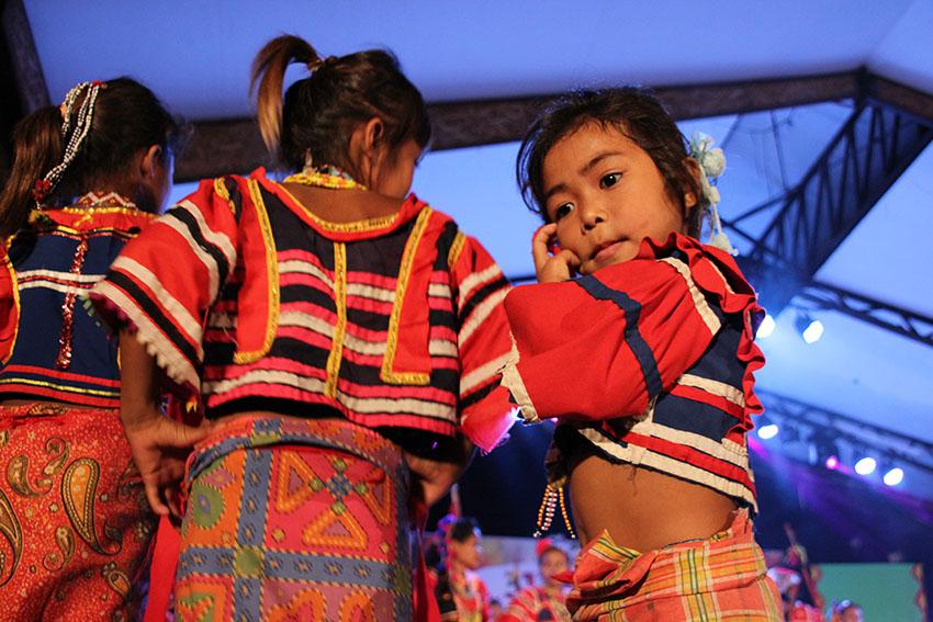 DAILY LIFE. In one of this year's Kadayawan sa Dabaw highlight, members of the Ata tribe perform a cultural dance that resembles their commitment to passing on their culture to the youth during the opening of the "Tribuhanong Pasundayag" (Tribal presentation) on Wednesday evening, August 16 at the Rizal Park in Davao City. (Paulo C. Rizal/davaotoday.com)