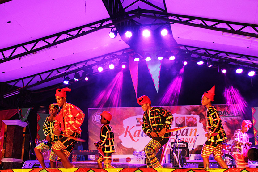 DAILY LIFE. In one of this year's Kadayawan sa Dabaw highlight, members of the Ata tribe perform a cultural dance that resembles their commitment to passing on their culture to the youth during the opening of the "Tribuhanong Pasundayag" (Tribal presentation) on Wednesday evening, August 16 at the Rizal Park in Davao City. (Paulo C. Rizal/davaotoday.com)