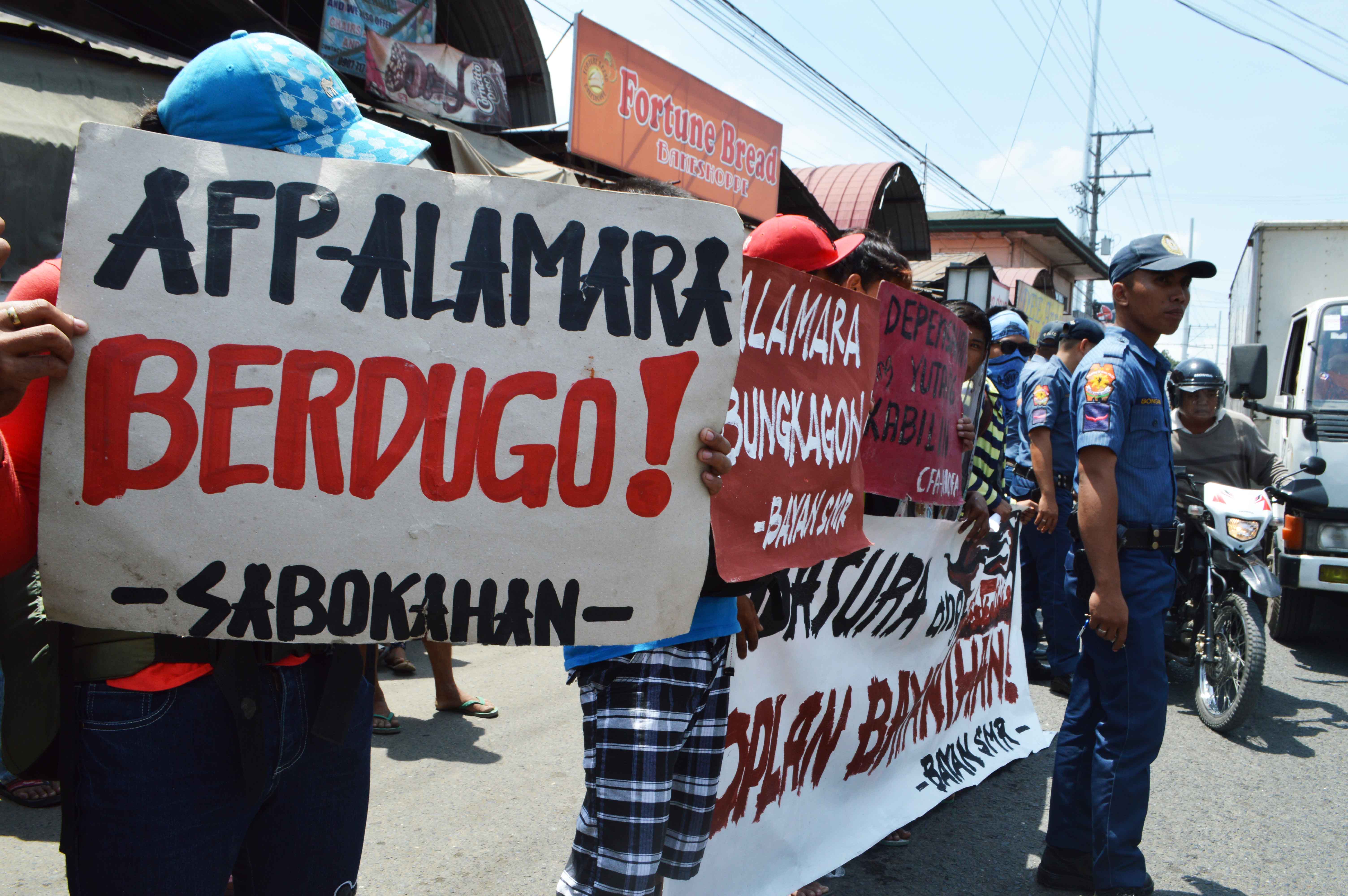Protesters rally at the Eastern Mindanao Command Headquarters.