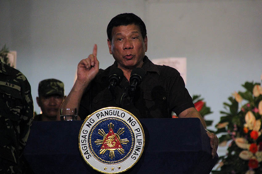 ASSURANCE. After baring yet another list that included mayors, vice mayors, policemen, and soldiers who are allegedly linked to illegal drugs trade in the country, President Rodrigo Duterte promises that not one member of the police or armed forces who are carrying out their duties will be put in jail during his term. Duterte reiterated his pronouncement during his visit at the Naval Station Felix Apolinario (NSFA) in Panacan, Davao City at around 1:00 am Sunday, August 7, 2016 (Paulo C. Rizal/davaotoday.com)