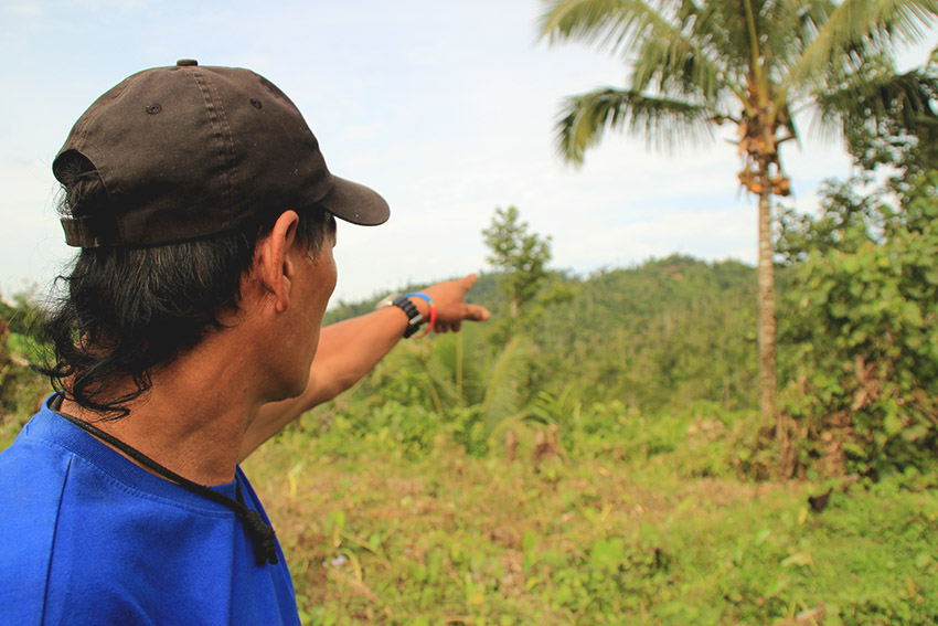  ENCOUNTER SITE. Purok 4 Chairman Lino Inbad points to where the encounter between the New People's Army and the government troops happened last August 4, 2016. (Earl O. Condeza/davaotoday.com)