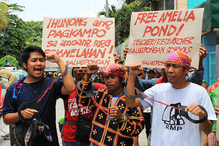 Tribal advocates, together with Lumad evacuees who are staying in a church compound in Davao City, seek help from the Department of Education to free Amelia Pond, a development worker in a Lumad school in Mindanao. (Earl O. Condeza/davaotoday.com)