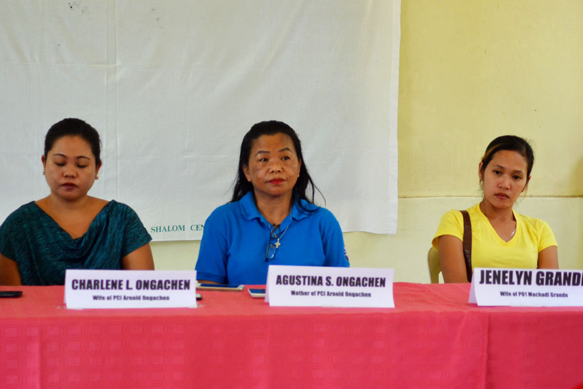 Relatives of the police officials who were captured by the New People's Army as its prisoners-of-war appealed for their immediate release in a press conference on Thursday, August 18 at the United Church of Christ in the Philippines Haran compound. From left: Charlene Ongachen, wife of Governor Generoso Municipal Police  Station Police Chief Inspector Arnold Ongachen; Agustina Ongachen, mother of the police officer; and Jenelyn Grande, wife of Police Officer 1 Michael Grande. (Zea Io Ming C. Capistrano/davaotoday.com)