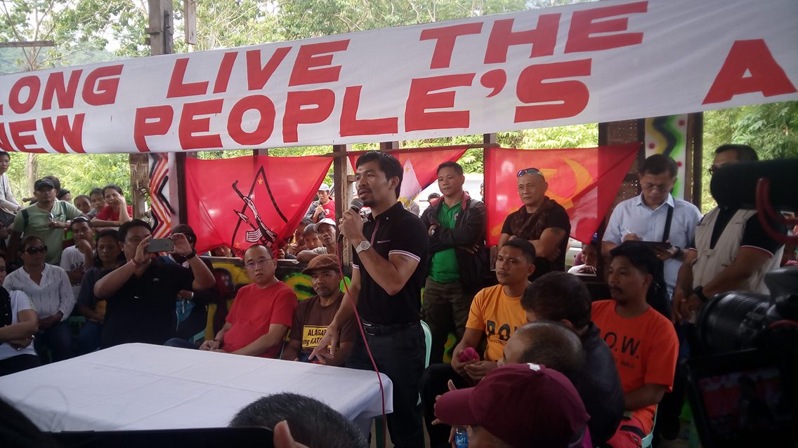 Senator Manny Pacquiao delivers a message during the release of two police officials who were held captive by the New People's Army. (Earl O. Condeza/davaotoday.com)