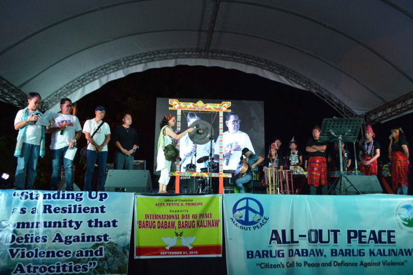 During the program, the organizers read the names of the victims of Martial Law and struck the gong for each name. (Medel V. Hernani/davaotoday.com) 