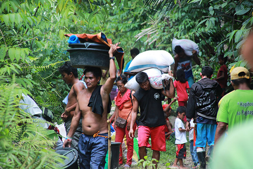 After a year of living as evacuees in the Sports Complex in Tandag City, the Lumad evacuees a re finally able to return to their homes in Barangay Diatagon, Lianga, Surigao del Sur following the pullout of the military in the area. (Paulo C. Rizal/davaotoday.com)