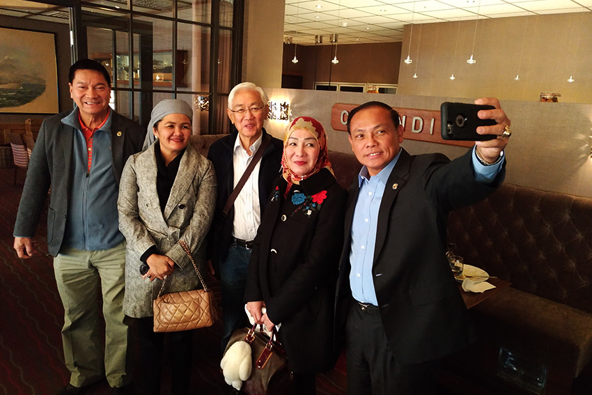 (From left) Members of the House of Representatives committee on peace and reconciliation Rep. Jesus Sacdalan, Deputy Speaker Bai Sandra Sema, committee chairman Rep. Ruby Sahali, and Rep. Leopoldo Bataouil took a group photo with National Democratic Front of the Philippines senior political adviser Luis Jalandoni (center) inside the Holmenfjord Hotell in Oslo, Norway Thursday. (Zea Io Ming C. Capistrano/davaotoday.com)