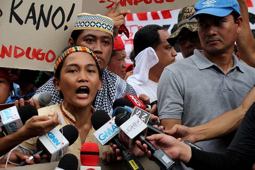 LEADERS. Piya Macliing Malayao of Katribu Partylist talks the protest rally in front of the Philippine National Police headquarters in Camp Rafael T. Crame days after the violent US Embassy dispersal. Behind her is Jerome Aba, spokesperson Suara Bangsamoro and also convener of Sandugo alliance. 