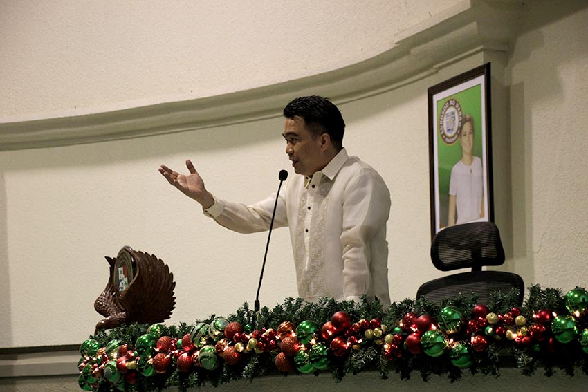 Davao City Councilor Bernard Al-ag presides over the 18th City Council's regular session from a raised platform decorated with Christmas ornaments on Tuesday, Nov. 15.  (Paulo C. Rizal/davaotoday.com)