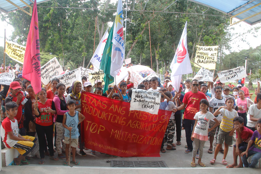 Farmers from the municipality of Matanao in Davao del Sur hold protest rally at the municipal gym Tuesday, Nov. 29 calling for the local government to support their demands to raise the price of their farm products. (Earl O. Condeza/davaotoday.com)  