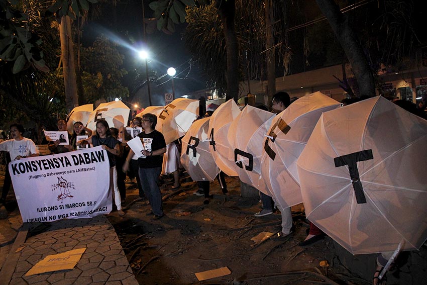 Members of Konsensya Dabaw, a local movement opposing Marcos' hero's burial, stage an indignation rally along Roxas Avenue in Davao City hours after the Supreme Court allowed the burial of former president Ferdinand Marcos at the Libingan ng mga Bayani on Tuesday, Nov. 8. (Paulo C. Rizal/davaotoday.com)