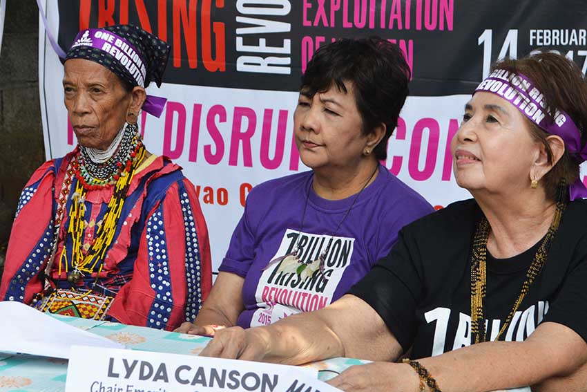 Former Gabriela party-list Rep. Luz Ilagan (center) and Ata Manobo woman leader Bibyaon Bigkay (right) hold a press conference during the launching of One Billion Rising 2017 on Wednesday, Nov. 7 inside the UCCP Haran Compound in Davao City where the Lumad seek refuge after being displaced from their communities due to militarization. (Medel V. Hernani/davaotoday.com)