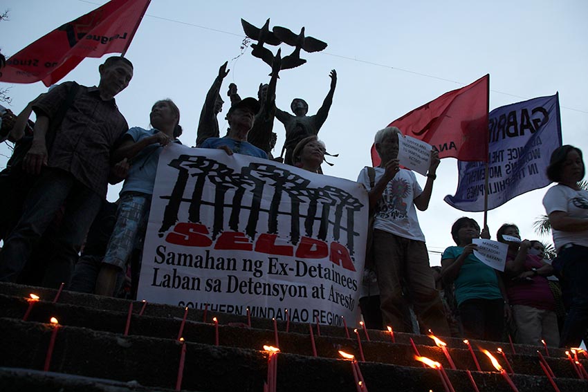 Martial law victims who are members of the Samahan ng mga Ex-Detainees Laban sa Detensyon at Aresto staged a rally condemning the decision of the Supreme Court to allow the hero's burial for former president Ferdinand Marcos in San Pedro Street, Davao City on Wednesday, Nov. 9. (Paulo C. Rizal/davaotoday.com)