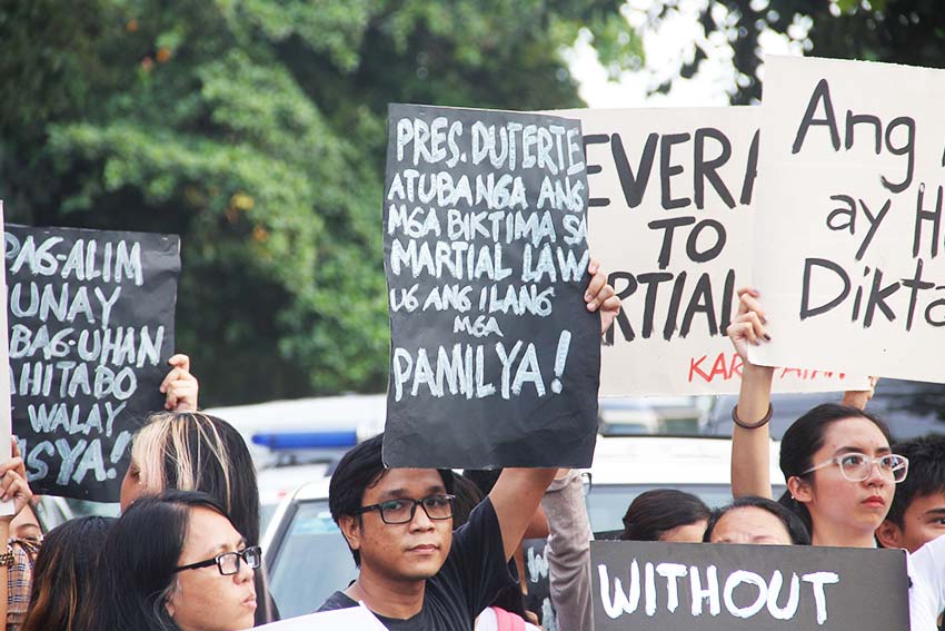 FACE THE NATION. A protester brings a placard telling President Rodrigo Duterte to face to the victims of Martial Law as what he promised during his campaign period before making decision on the Marcos' burial. (Earl O. Condeza/davaotoday.com)