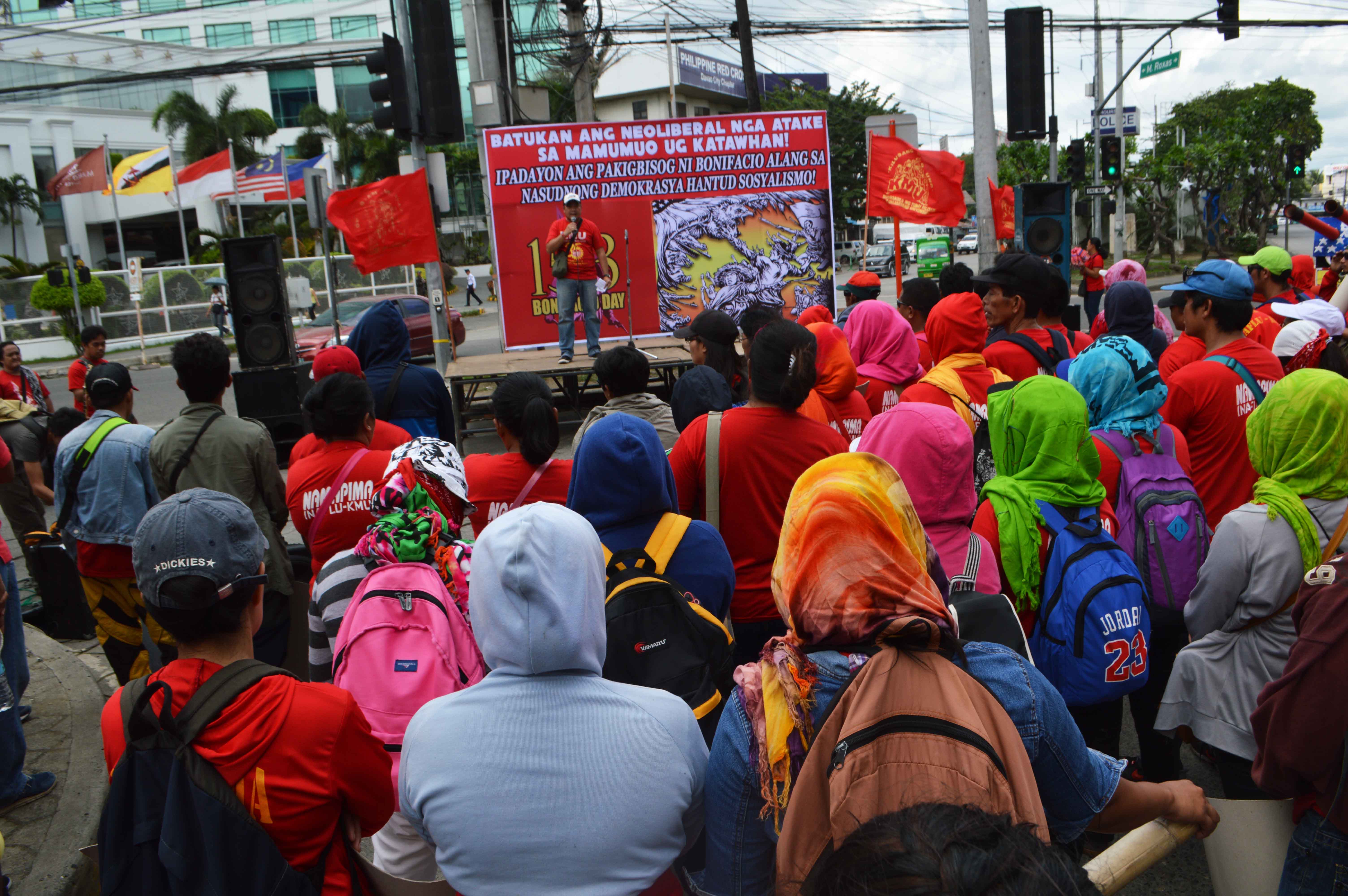 Workers led by the militant Kilusang Mayo Uno gather at the Freedom Park in Davao City to commemorate the 153rd birth anniversary of national hero Andres Bonifacio. The workers criticized US intervention which they said is a way of emulating the patriotic spirit of Bonifacio who fought the Spanish colonizers. (Medel V. Hernani/davaotoday.com) 