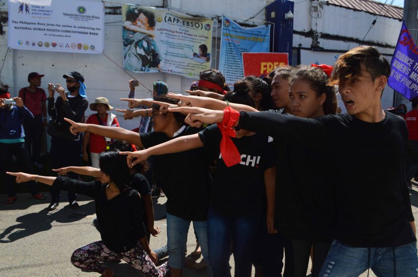 Militant groups hold a protest rally in front of the Eastern Mindanao Command  Headquarter at Naval Station Felix Apolinario in Panacan, Davao City on Saturday, Dec. 10  to denounce the continuing harassment of the military to human rights activists. (Medel V. Hernani/davaotoday.com)