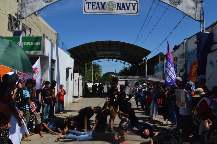 A youth group performs a cultural presentation in front of the  Eastern Mindanao Command  Headquarter at Naval Station Felix Apolinario in Panacan, Davao City depicting the militarization of Lumad and peasant communities in Davao region during the global observance of the International Human Rights Day on Saturday, Dec. 10. (Medel V. Hernani/davaotoday.com)