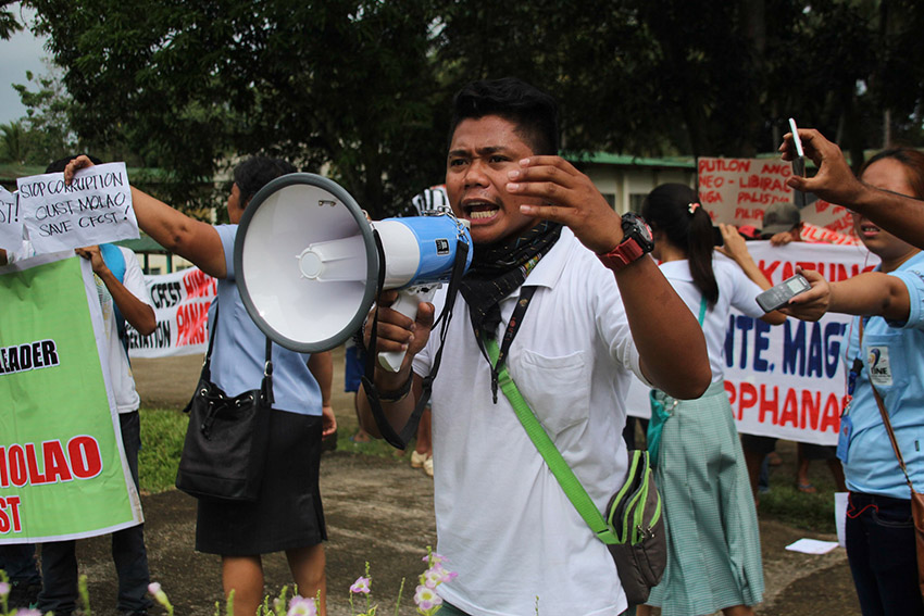 FED UP. Elfred Llave, 21, who studies in the Cotabato Foundation College of Science and Technology says he can no longer stay blind and mute about the corruption going on in his school. Llave is among the students and faculty who demand the ouster of school president Dr. Samson Molao. (Paulo C. Rizal/davaotoday.com)