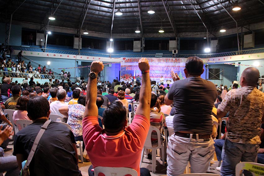 Barangay officials from Davao City rejoice following President Rodrigo Duterte's announcement that they will receive cash gifts this month during the Christmas party held at the Davao Recreation Center on Tuesday, Dec.27. Barangay captains will receive P10,000 each while barangay councilors will get P3,000 each. Duterte said the money came from a certain politician's campaign donation that he refused to receive. (Paulo C. Rizal/davaotoday.com) 