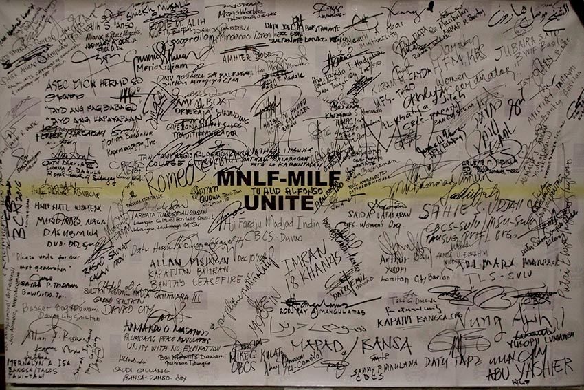 Some 125 Bangsamoro civil society organizations signed a unity board calling for the unity of the Moro National Liberation Front and the Moro Islamic Liberation Front, two Moro revolutionary organizations currently negotiating peace with the Philippine government during the three day Bangsamoro Multi-sectoral Leaders' Summit on Unity and Solidarity held at the Royal Mandaya Hotel in Davao City from Dec. 6-8. (Paulo C. Rizal/davaotoday.com)