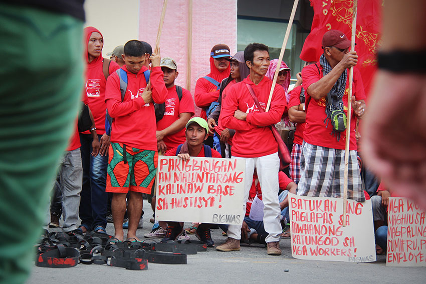 Workers call for peace based on justice and an end to human rights abuses against workers during a protest action coinciding with the 153rd Bonifacio Day at the Freedom Park in Davao City on Wednesday, Nov. 30. (Maricar Emata/davaotoday.com)