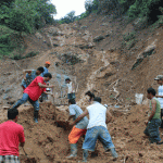 Rescue volunteer continue to seach for pantukan landslide victims